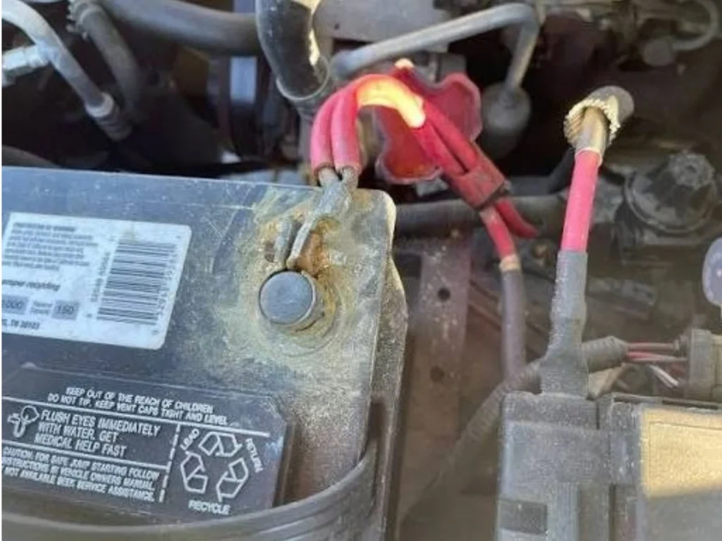 Corroded Ford battery cable terminal and connection